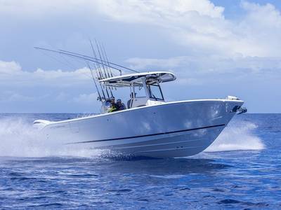 cobia 285 cc boat on water